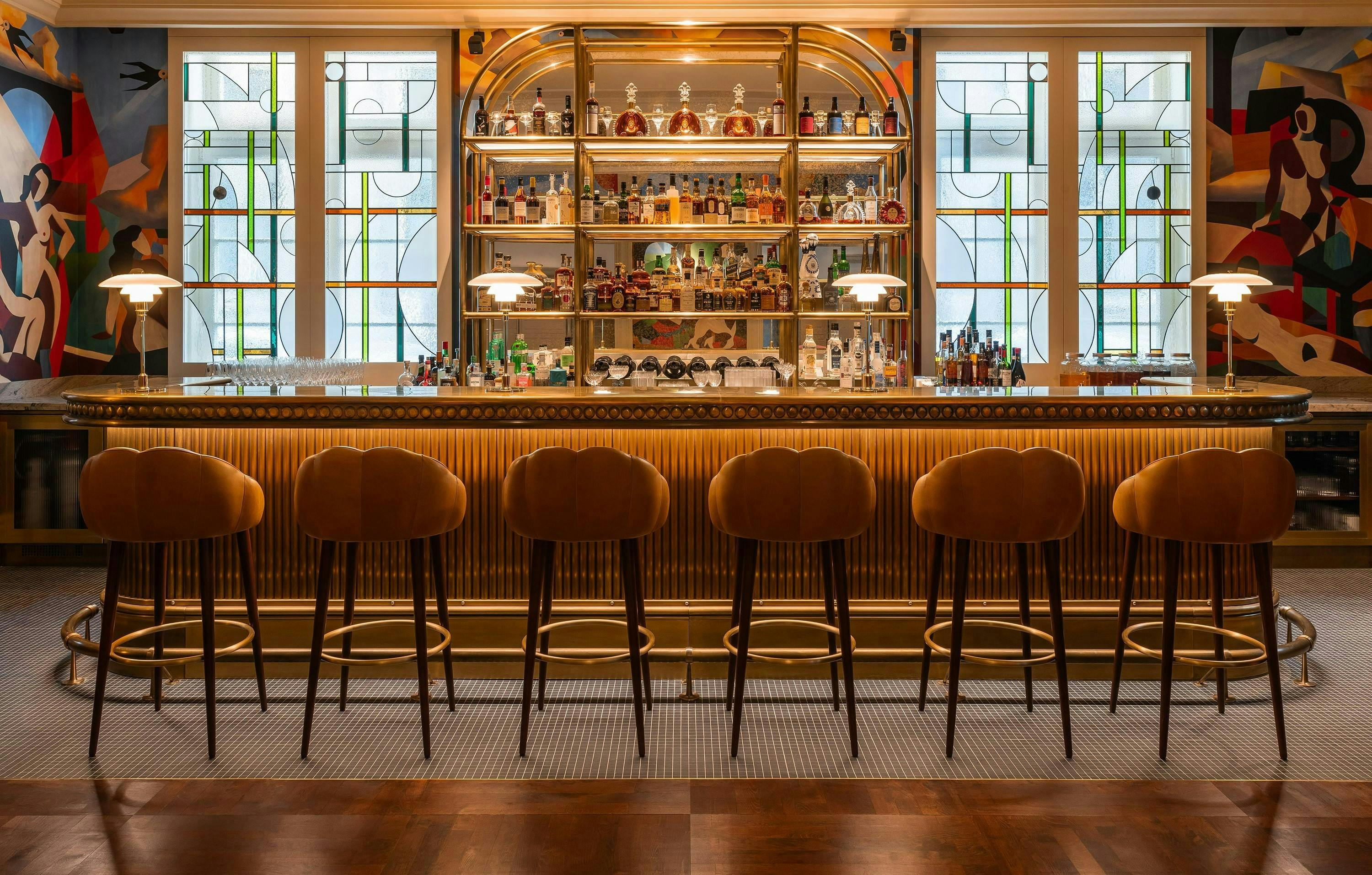 alcohol bar bar counter beverage pub chair furniture lamp indoors interior design