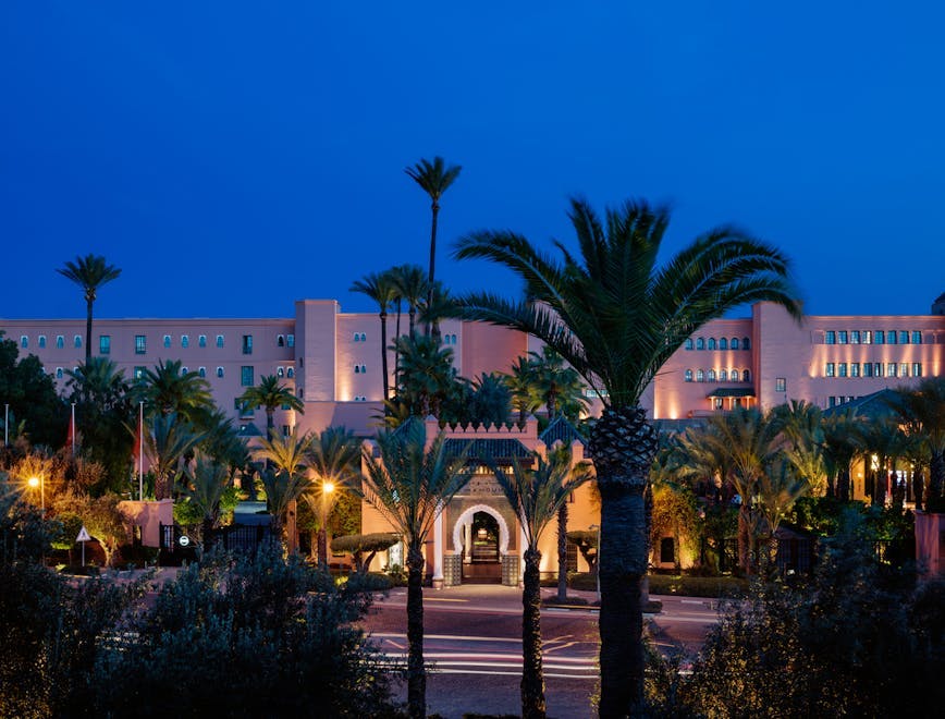 alan keohane morocco mamounia hotel marrakech north entrance facade summer palm tree tree building housing villa resort city hacienda