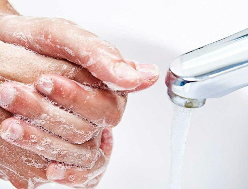 washing hand indoors