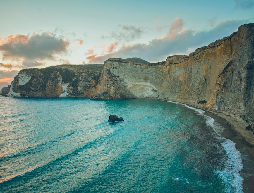 nature sea outdoors water cliff promontory shoreline land coast scenery
