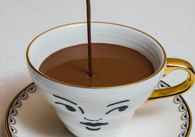 coffee cup cup pottery saucer dessert food milk beverage drink