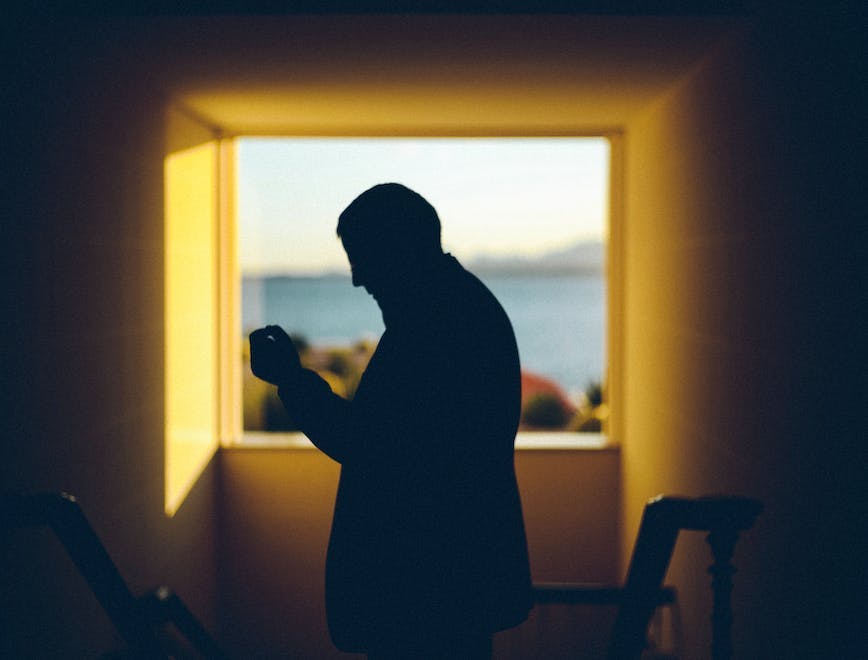 silhouette person human window