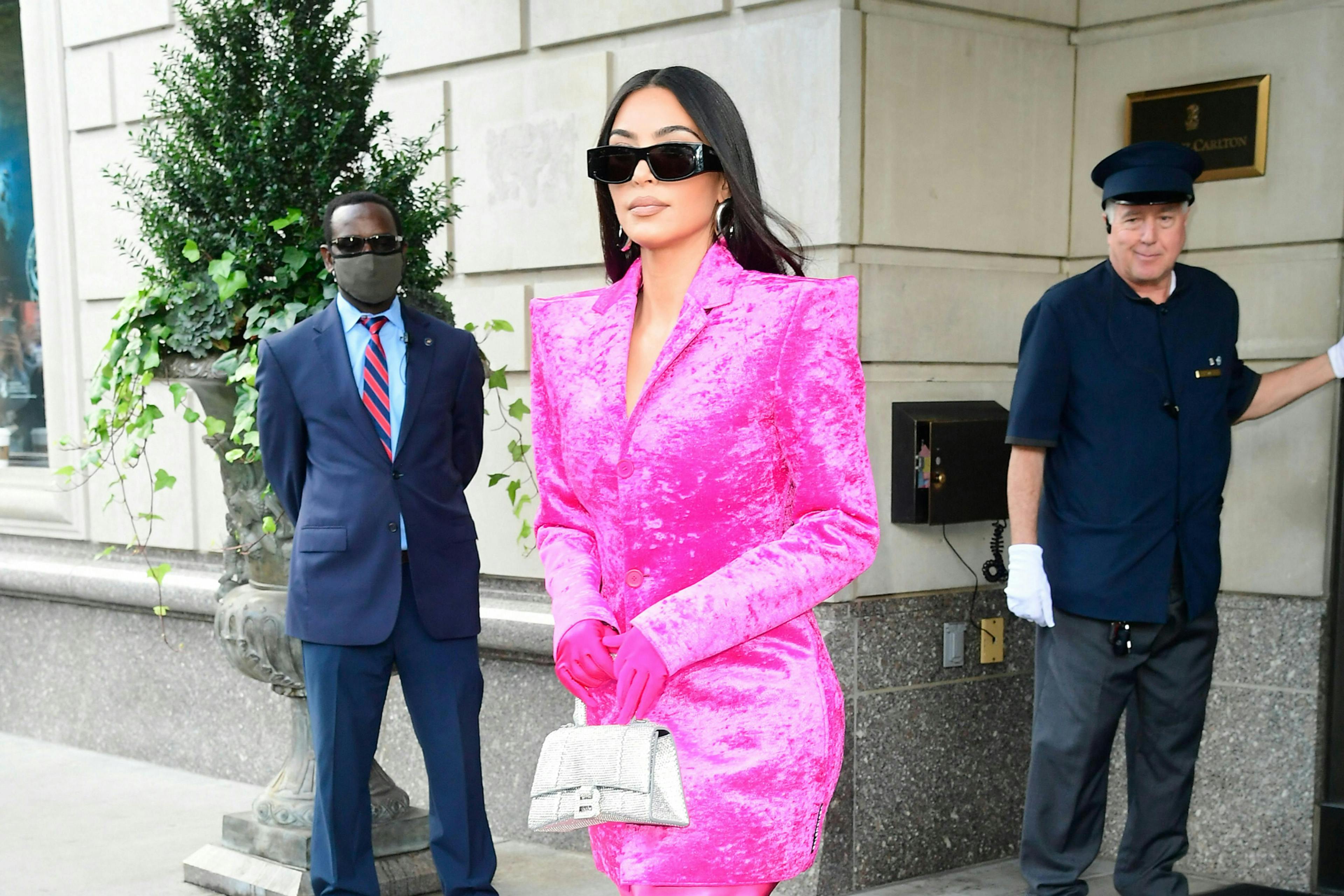 new york ny clothing person sunglasses tie suit overcoat coat sleeve long sleeve female