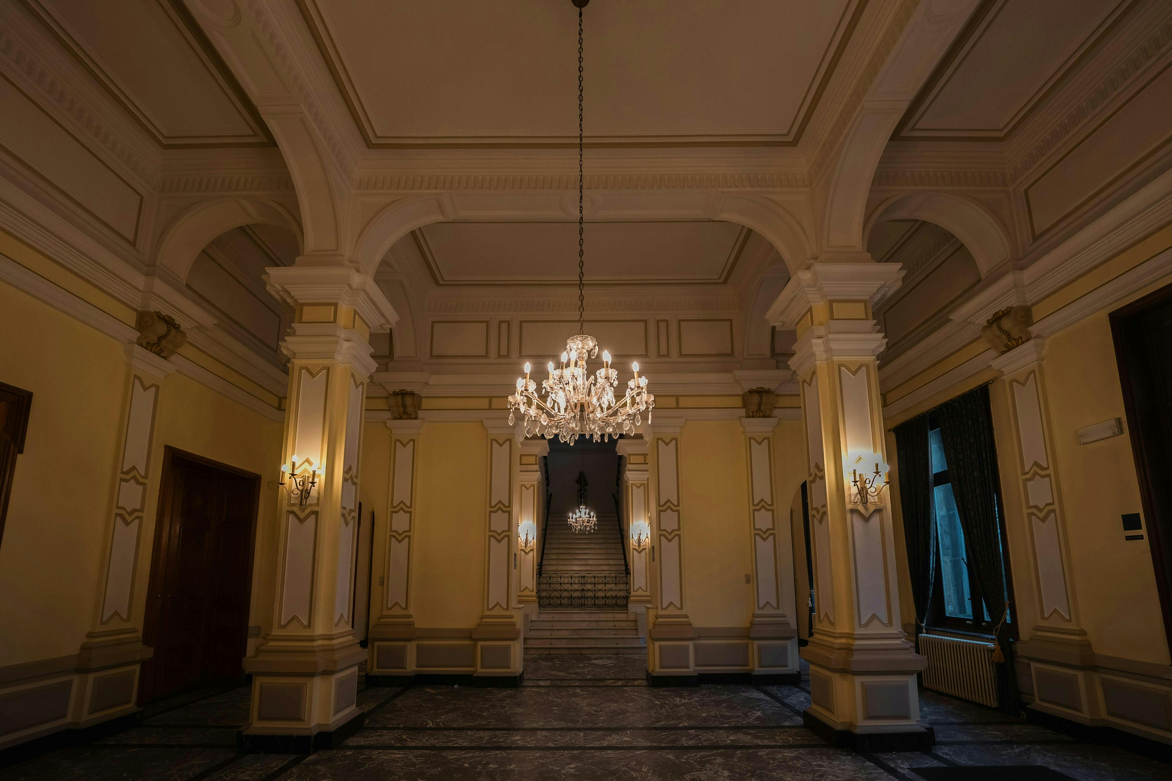 chandelier lamp flooring floor interior design indoors corridor building ballroom room