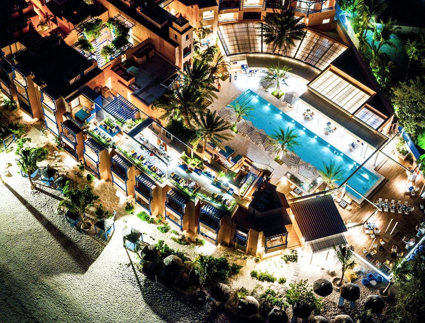 building hotel resort pool water summer swimming pool outdoors city tree