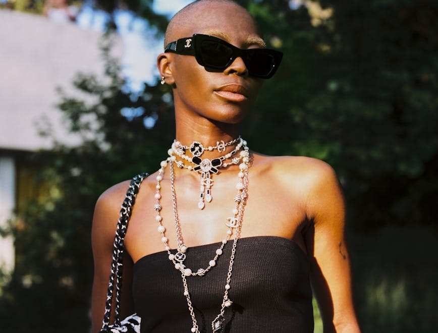 accessories sunglasses handbag necklace formal wear adult female person woman evening dress