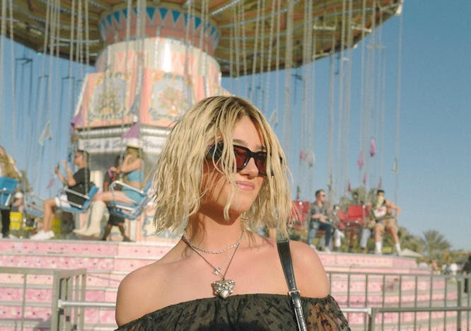 amusement park fun theme park blouse clothing person accessories necklace blonde portrait